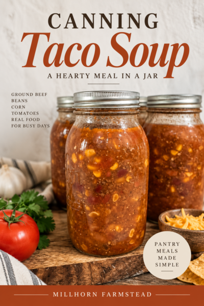 Jars of pressure canned taco soup with ground beef, beans, corn and tomatoes